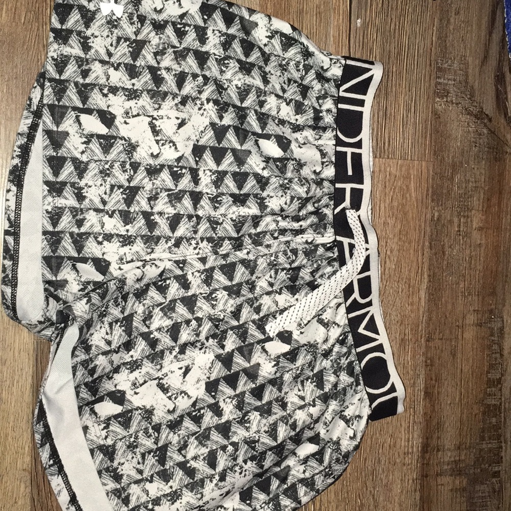 White and black under armor shorts